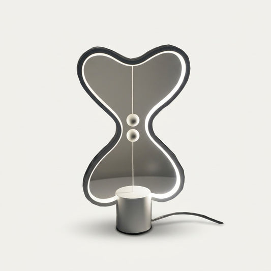 Lumiqia floating balance LED night lamp glowing on nightstand