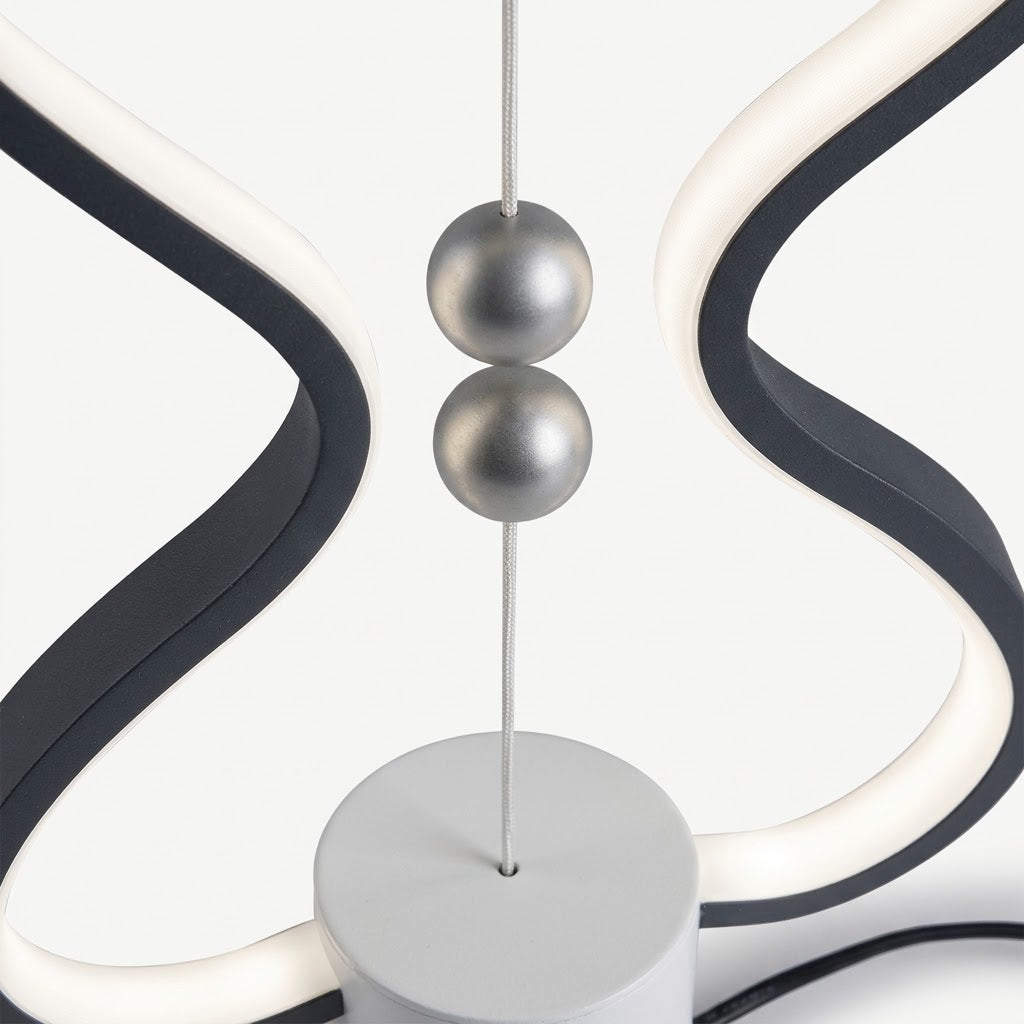 Lumiqia floating balance LED night lamp glowing on nightstand