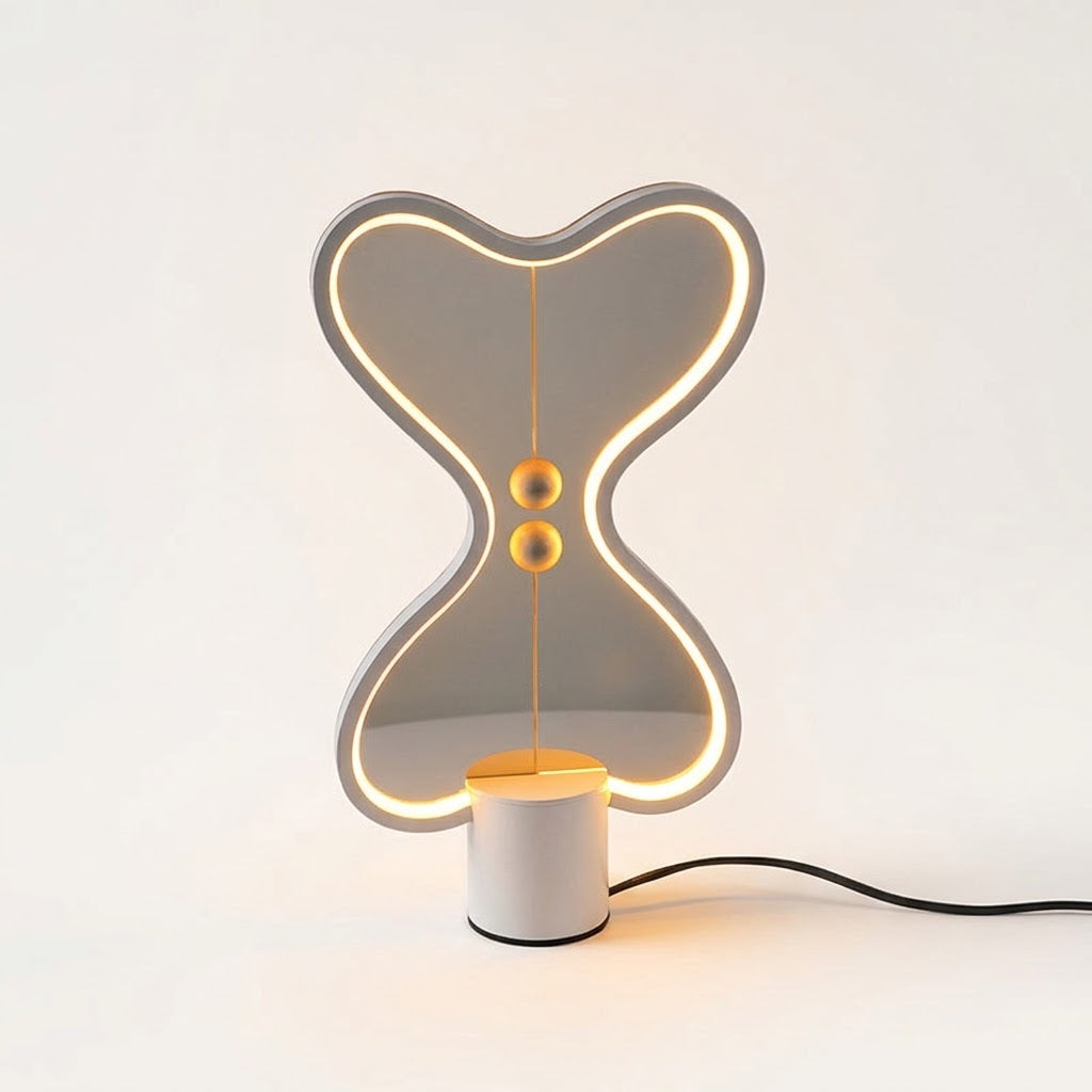 Lumiqia floating balance LED night lamp glowing on nightstand