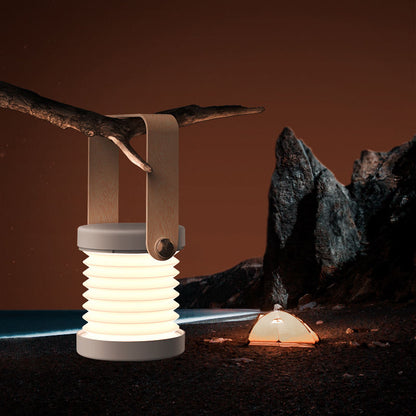 Lumiqia foldable touch dimmable lantern lamp glowing on bedside table