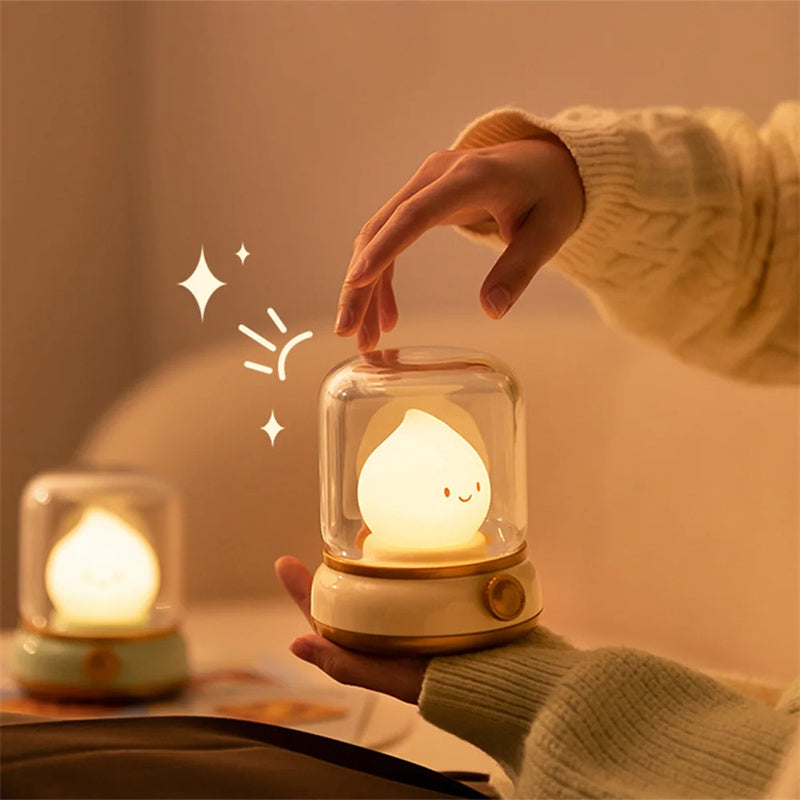 Lumiqia retro oil lamp style LED night light glowing on bedside table
