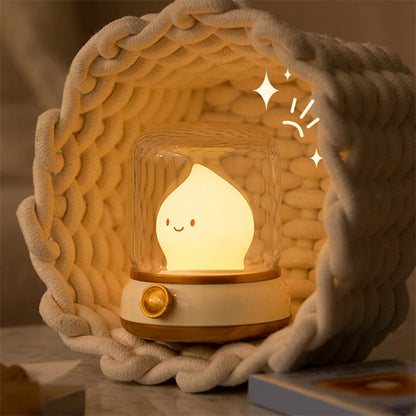 Lumiqia retro oil lamp style LED night light glowing on bedside table