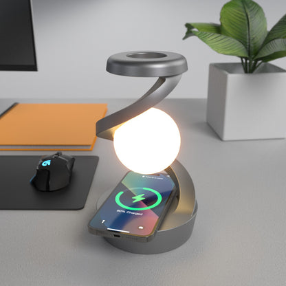 Lumiqia rotating moon lamp with wireless phone charger on nightstand