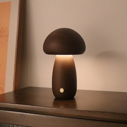 Lumiqia wooden mushroom LED night light glowing on bedside table