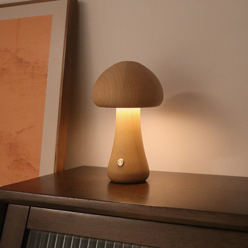 Lumiqia wooden mushroom LED night light glowing on bedside table